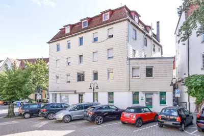 WOHN- UND GESCHÄFTSHAUS MIT 10 WOHNEINHEITEN UND 3 LADENEINHEITEN